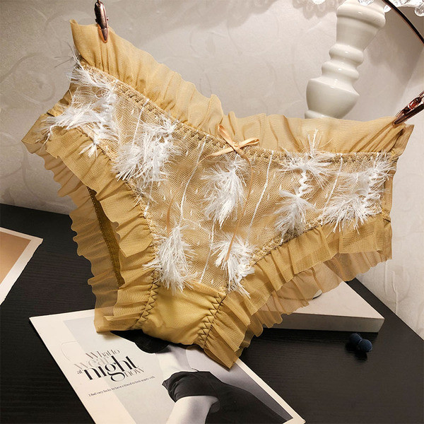 Női bikini tüllel és tollal