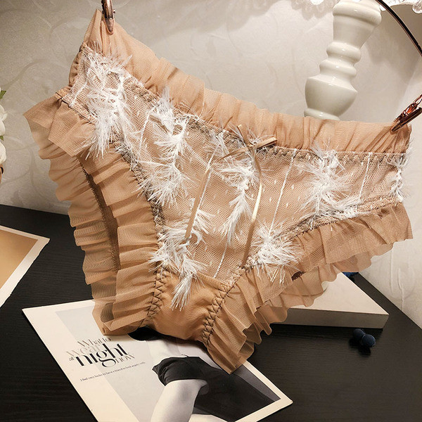 Női bikini tüllel és tollal