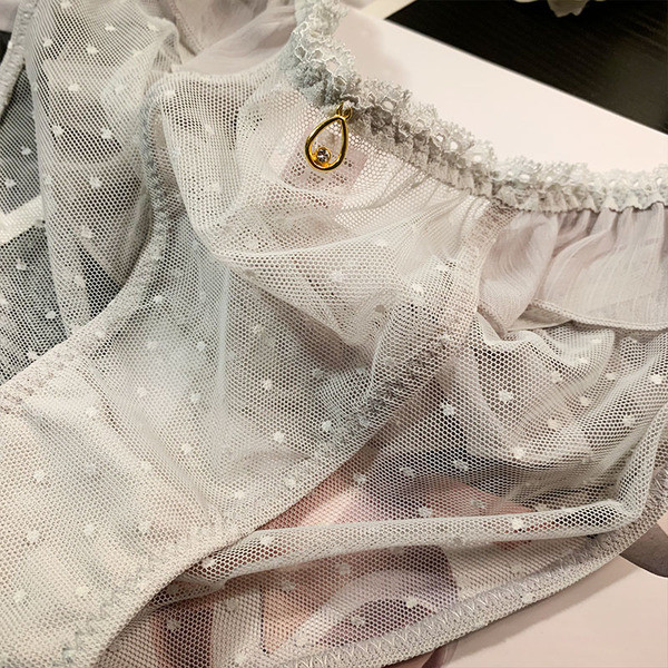 Pöttyös női bikini fém elemmel és fürtökkel