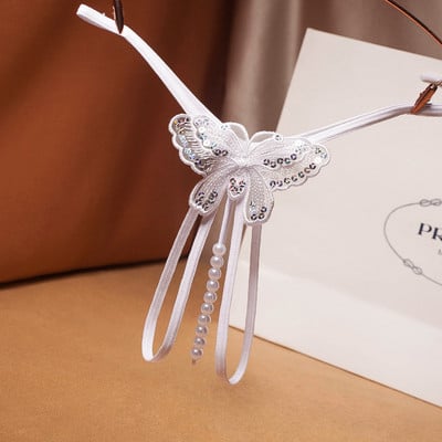 Изрязан модел дамски прашки с перли и бродерия пеперуда с пайети