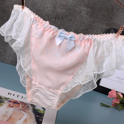 Modern női bikini szalaggal és csipkével