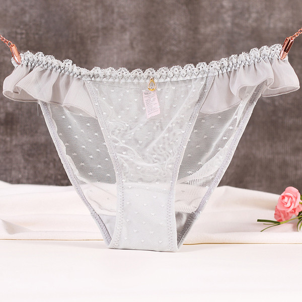 Átlátszó női bikini fém elemekkel