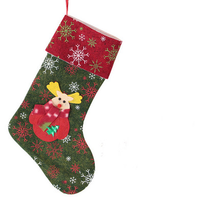 Ukrasna božićna čarapa s raznim aplikacijama
