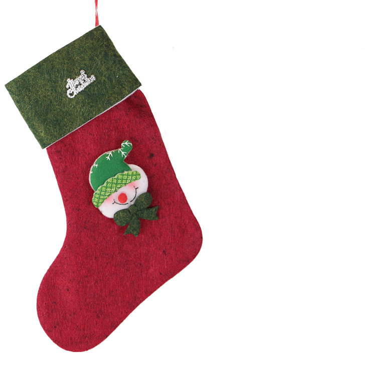 Ukrasna božićna čarapa s raznim aplikacijama