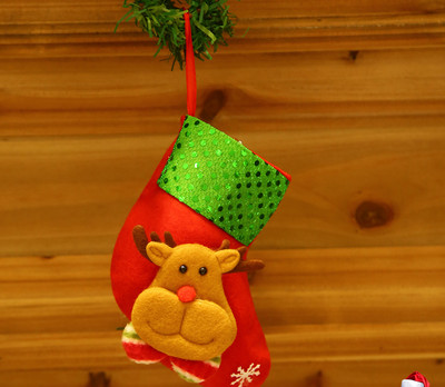 Kis dekoratív karácsonyi zokni különféle 3D dekorációkkal