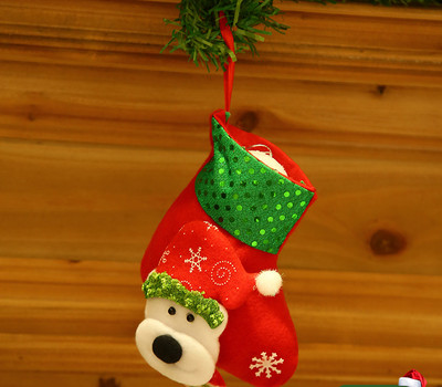 Kis dekoratív karácsonyi zokni különféle 3D dekorációkkal