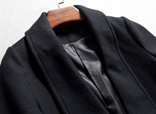 Modern női hosszú kabát fekete zsebekkel