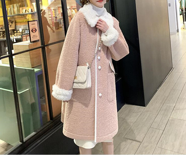 Modern női télikabát zsebekkel és gallérral