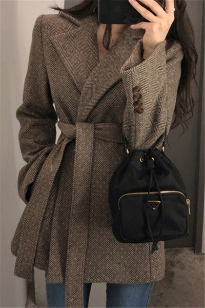 Új modell női kabát télire alkalmas övvel