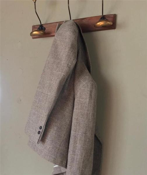 Őszi kockás női kabát zsebekkel