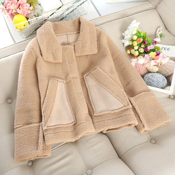 Női pehelykabát klasszikus gallérral és zsebbel