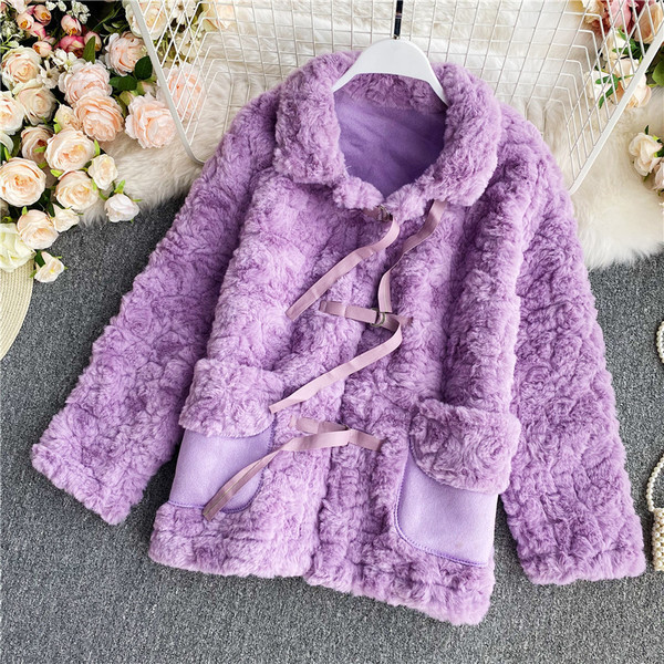 Novi model perje ženske kapute sa džepovima