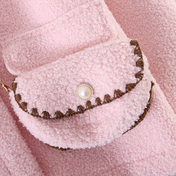 Γυναικείο χνουδοτό παλτό με γιακά και τσέπες