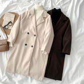 Új modell női hosszú kabát gombokkal és zsebekkel