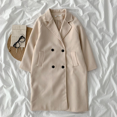 Új modell női hosszú kabát gombokkal és zsebekkel