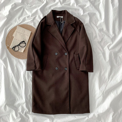 Új modell női hosszú kabát gombokkal és zsebekkel