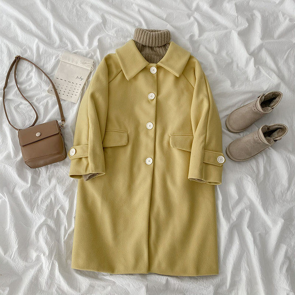 Közepes hosszúságú alkalmi női kabát