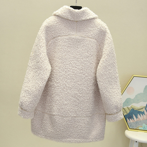 Modern női tollkabát zsebekkel - télire is alkalmas