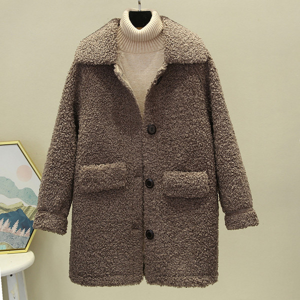 Modern női tollkabát zsebekkel - télire is alkalmas