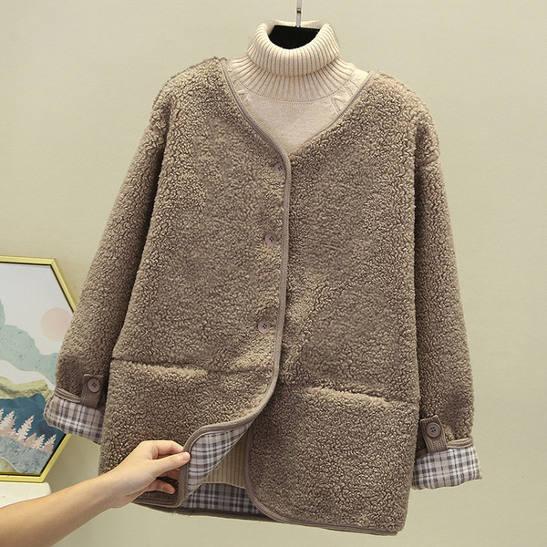 Modern pehely női kabát gombokkal és zsebekkel