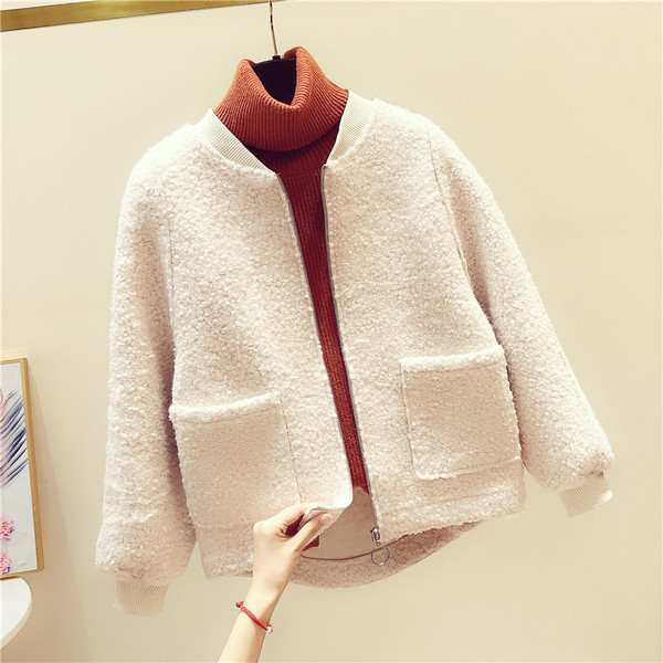 Női rövid őszi kabát cipzárral és zsebbel