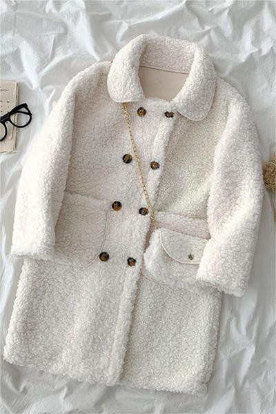 Дълго дамско пухено палто с копчета и джобове