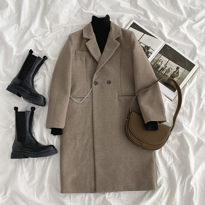 Női télikabát gombokkal és zsebekkel