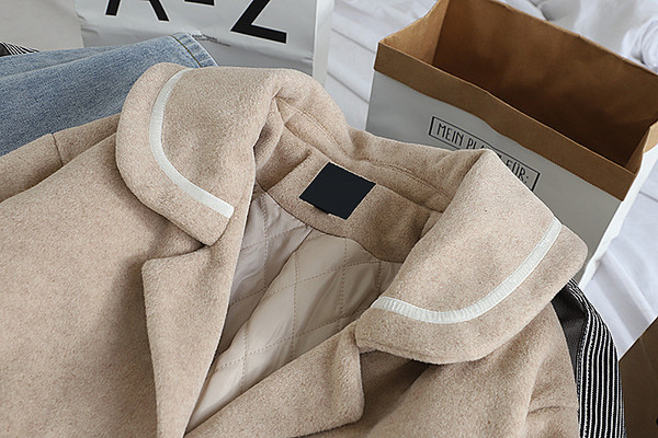 Női alkalmi gyapjúkabát zsebekkel