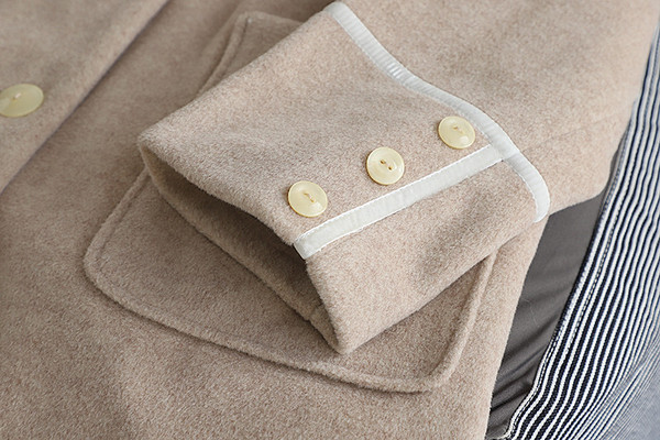 Női alkalmi gyapjúkabát zsebekkel