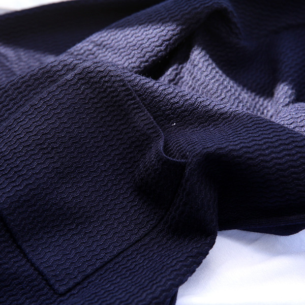 Kék színű, gombos férfi hétköznapi kardigán