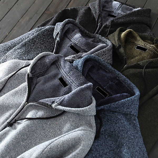 Kötött mellény béléssel és kapucnival