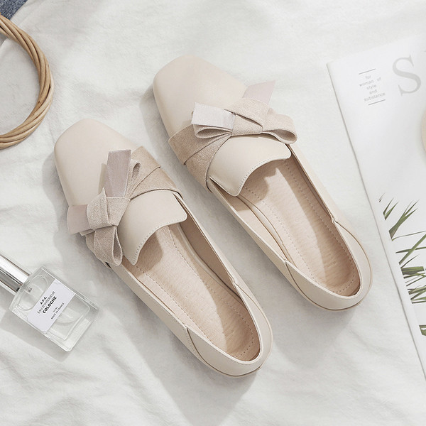 Moderne ženske kožne cipele s trakom i ravnim potplatom