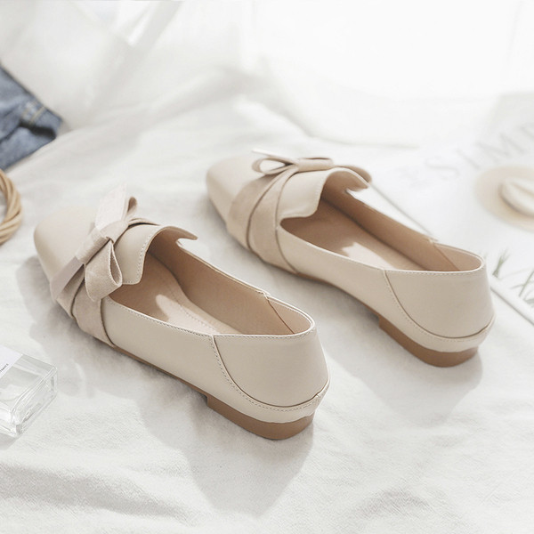 Moderne ženske kožne cipele s trakom i ravnim potplatom