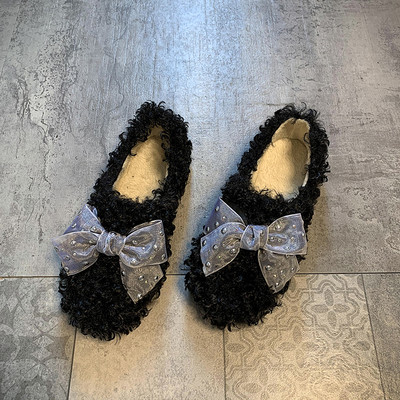 Női pehelycipő lapos talppal és szalaggal