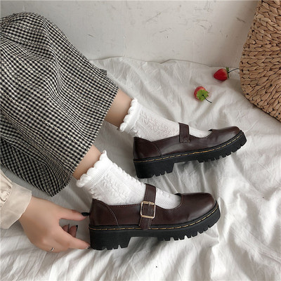 Női bőr cipő csattal fekete és barna színben