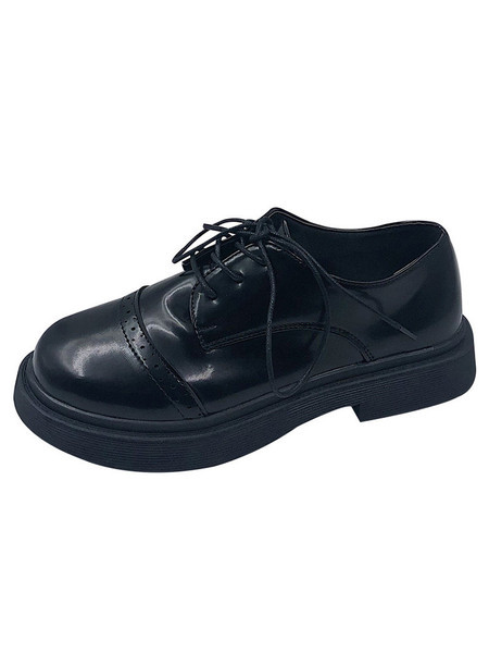 Alkalmi női cipő fűzővel és lapos talppal, fekete színben