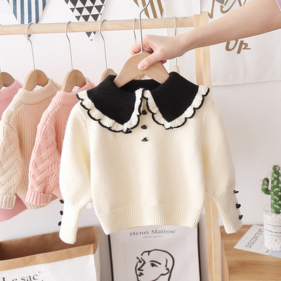 Alkalmi gyerekpulóver gombokkal és kerek nyakkivágással, lányoknak