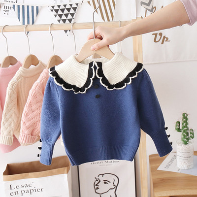 Alkalmi gyerekpulóver gombokkal és kerek nyakkivágással, lányoknak