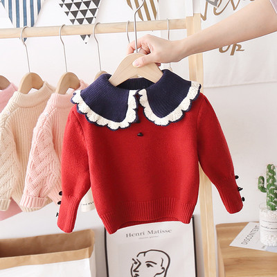 Alkalmi gyerekpulóver gombokkal és kerek nyakkivágással, lányoknak