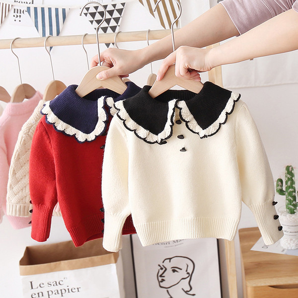 Alkalmi gyerekpulóver gombokkal és kerek nyakkivágással, lányoknak