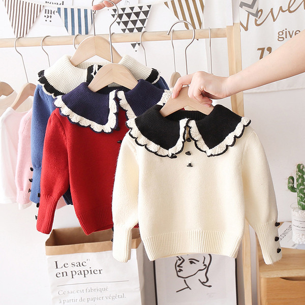 Alkalmi gyerekpulóver gombokkal és kerek nyakkivágással, lányoknak