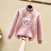 Modern gyerekpulóver lányoknak magas gallérral és rátéttel