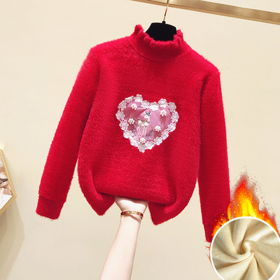 Modern gyerekpulóver lányoknak magas gallérral és rátéttel