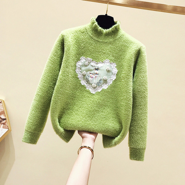 Modern gyerekpulóver lányoknak magas gallérral és rátéttel