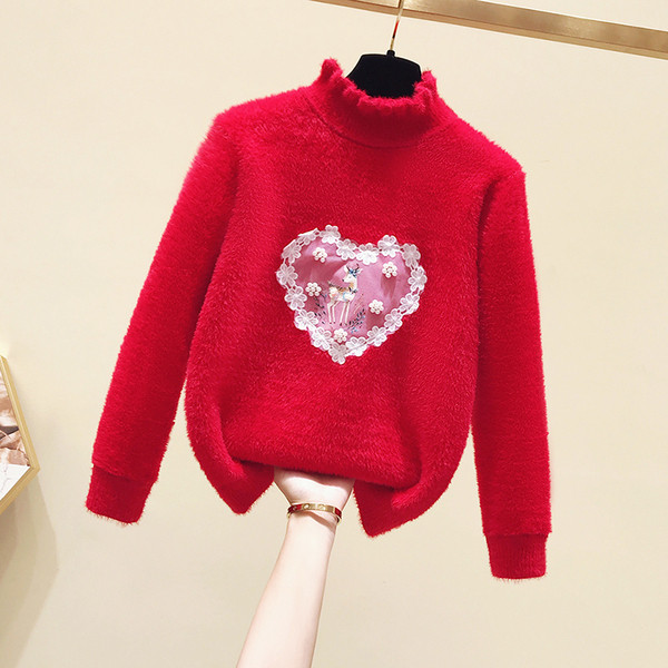 Modern gyerekpulóver lányoknak magas gallérral és rátéttel