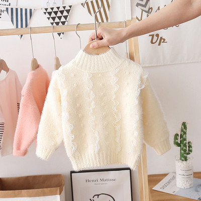 Modern gyerekpulóver lányoknak magas gallérral és tülllel