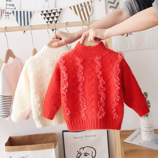 Modern gyerekpulóver lányoknak magas gallérral és tülllel