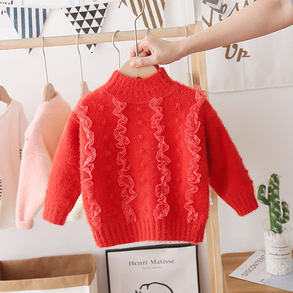 Modern gyerekpulóver lányoknak magas gallérral és tülllel