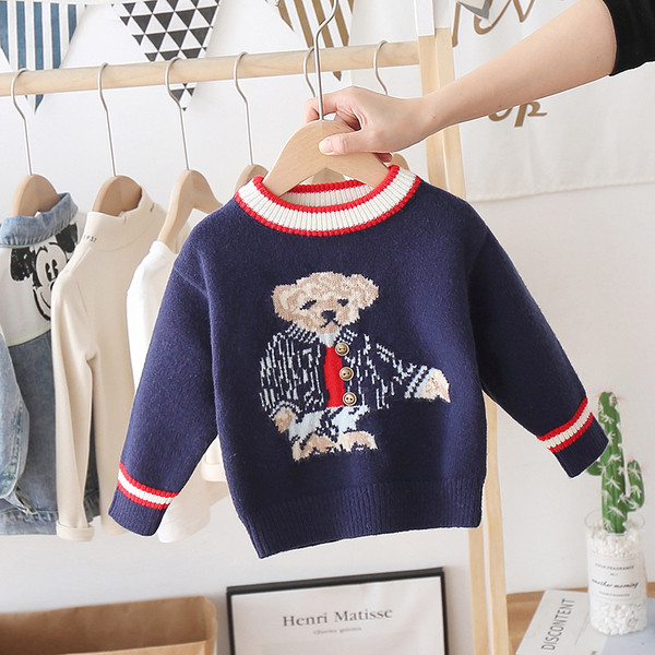 Alkalmi gyerekpulóver színes hímzéssel és ovális nyakkivágással