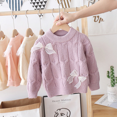 Gyermek téli pulóver szalaggal és ovális nyakkivágással, alkalmas lányoknak